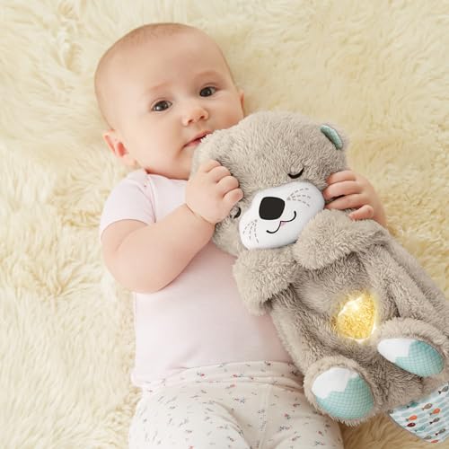 Fisher-Price Soothe 'n Snuggle Otter, Portable Plush Baby Toy with Music, Sounds, Lights and Breathing Motion