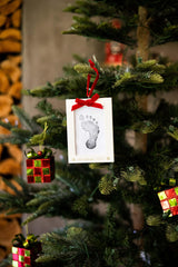 Pearhead Christmas 2023 Holiday Baby's Print Ornament with Clean-Touch Ink Pad, Baby's Print Handprint or Footprint Keepsake, Christmas Ornament with Ribbon, Nursery Décor Ornament